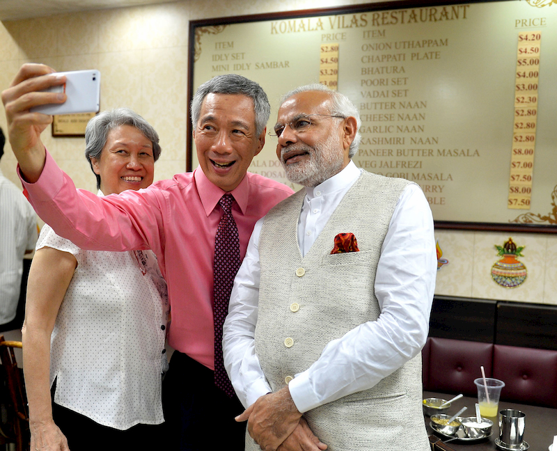Prime minister Lee Hsien Loong, Ho Ching, and Prime Minister Modi taking a wefie