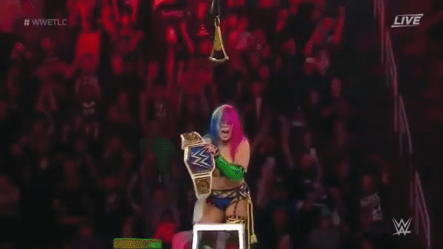 A gif of Asuka, a wrestler from Japan who won the WWE Women's Championship.