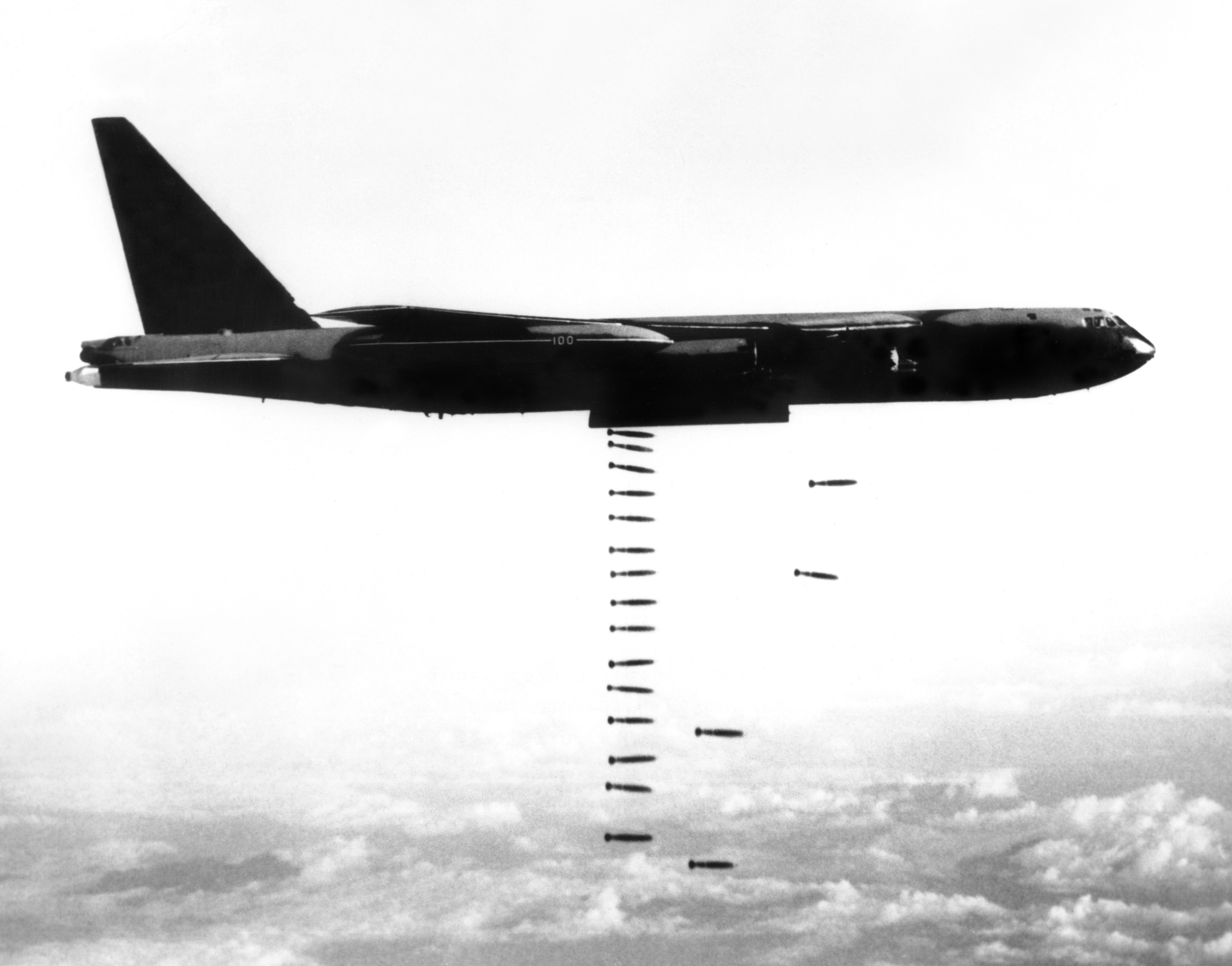 B-52 Stratofortress releasing a 'bomb train' over targets in Vietnam during the Second Indochina War, also known as the Vietnam War.